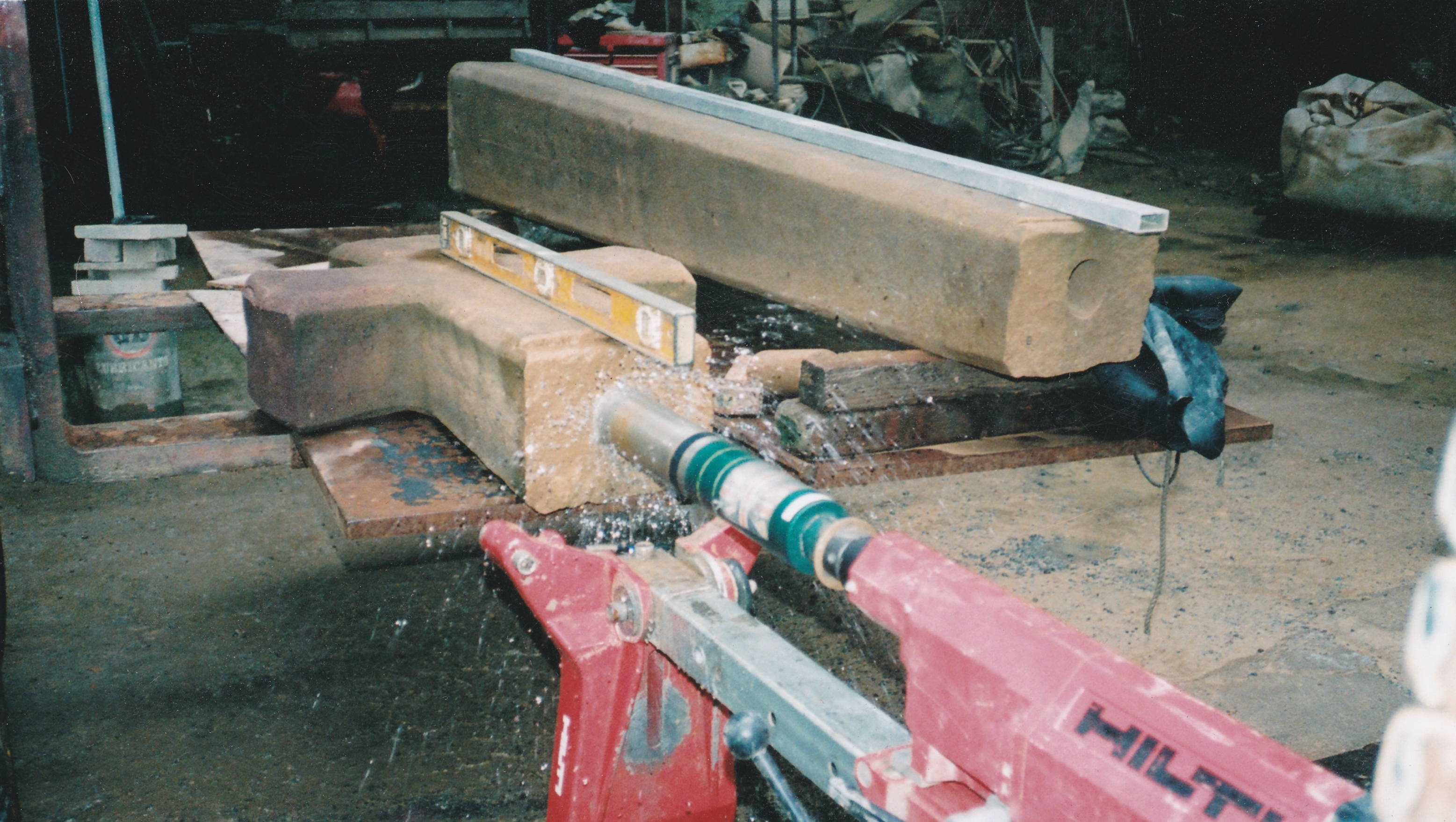 War Memorial sat on a piece of machinery being fixed with a drill 