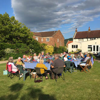 Open Garden Visitors enjoying a refreshment after the event